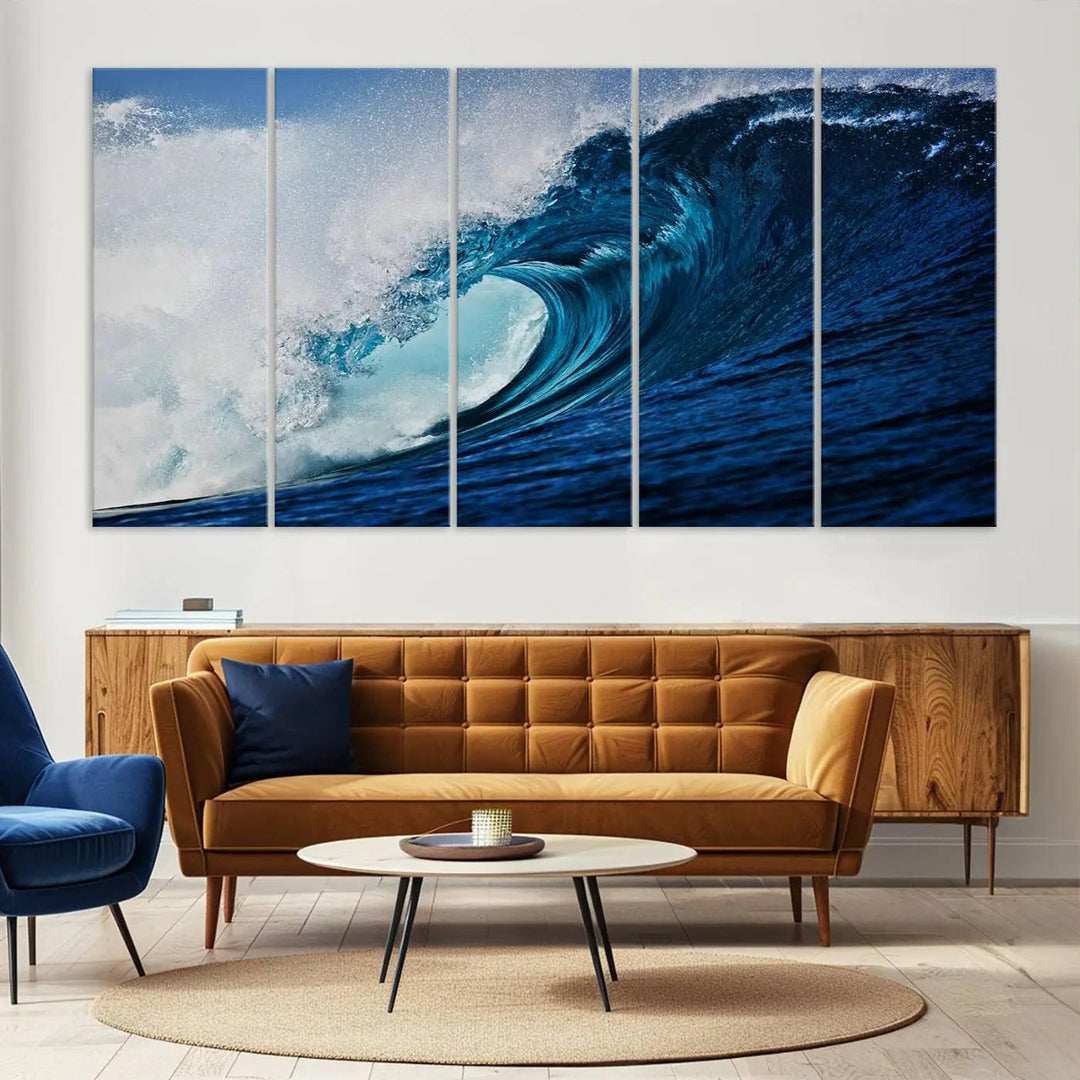 A large wall print of "Ocean Wave at Sunset Canvas Art" is displayed, creating a coastal vibe.