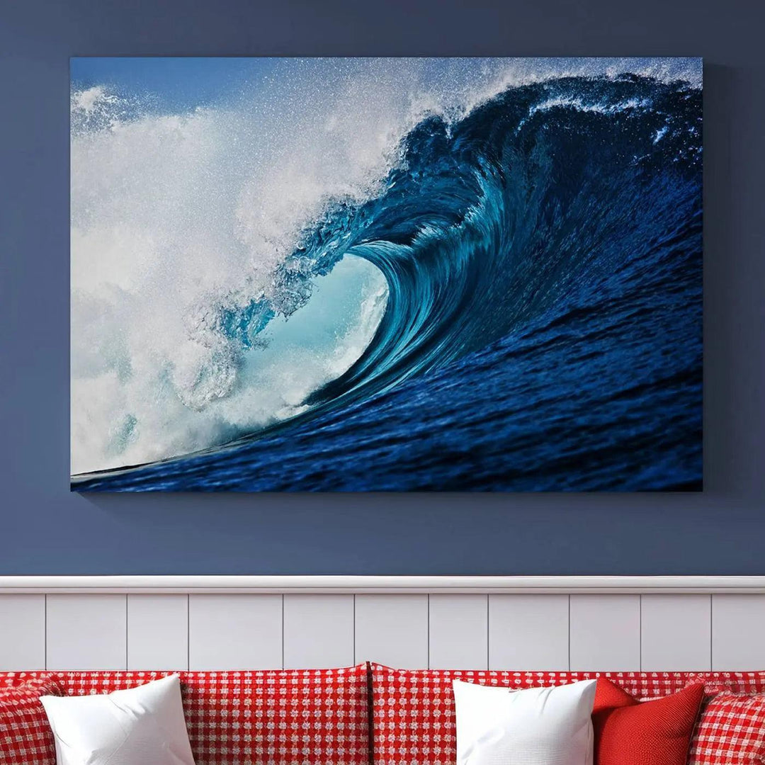 A large wall print of "Ocean Wave at Sunset Canvas Art" is displayed, creating a coastal vibe.