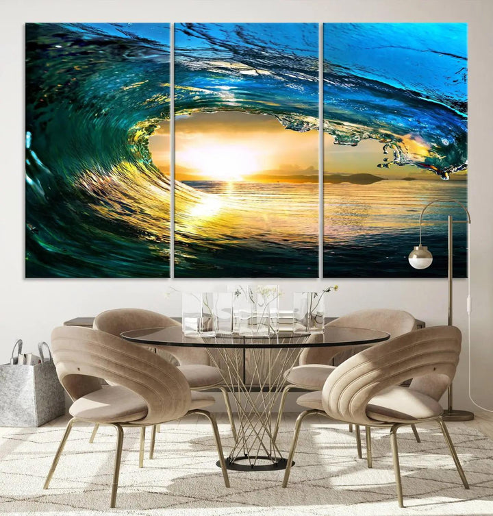 A modern dining room with a coastal vibe showcases a striking large wall print, the "Ocean Wave at Sunset Canvas Art," depicting vibrant water waves. The room features abstract wave artwork on the walls. This eye-catching piece of coastal art infuses the space with seaside serenity.