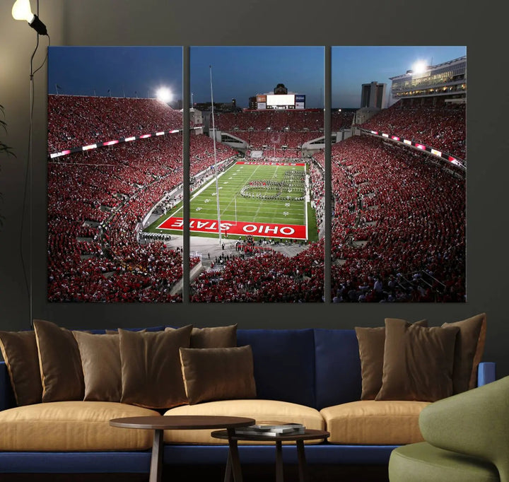 The Ohio State University Buckeyes Football Team Print, showcasing a vibrant view of the Columbus Ohio Stadium, is displayed in a modern room. Its gallery-quality finish enhances the space.