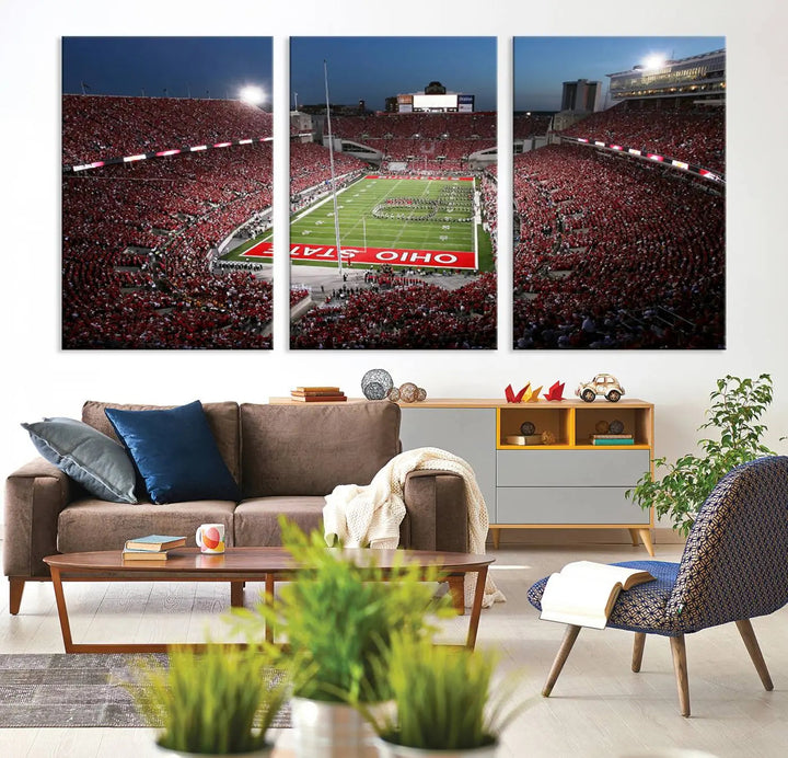 The Ohio State University Buckeyes Football Team Print, showcasing a vibrant view of the Columbus Ohio Stadium, is displayed in a modern room. Its gallery-quality finish enhances the space.