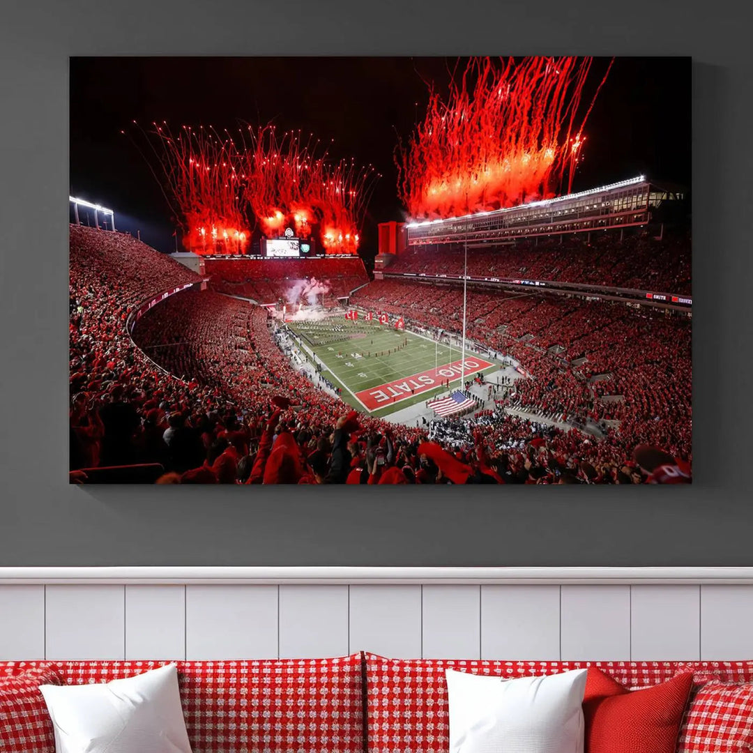 The Ohio State University Buckeyes Football Team Print showcases a vibrant Columbus Ohio Stadium, teeming with fans and illuminated by red fireworks against the night sky. Printed on premium canvas with a gallery-quality finish, this exquisite piece of wall art makes an elegant statement and enhances any space with sophistication.