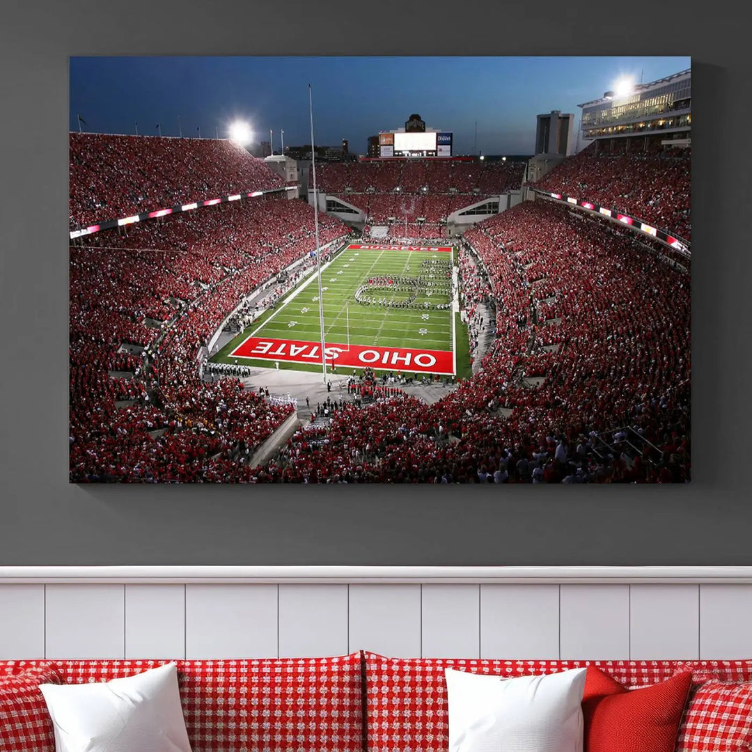 The Ohio State University Buckeyes Football Team Print, showcasing a vibrant view of the Columbus Ohio Stadium, is displayed in a modern room. Its gallery-quality finish enhances the space.