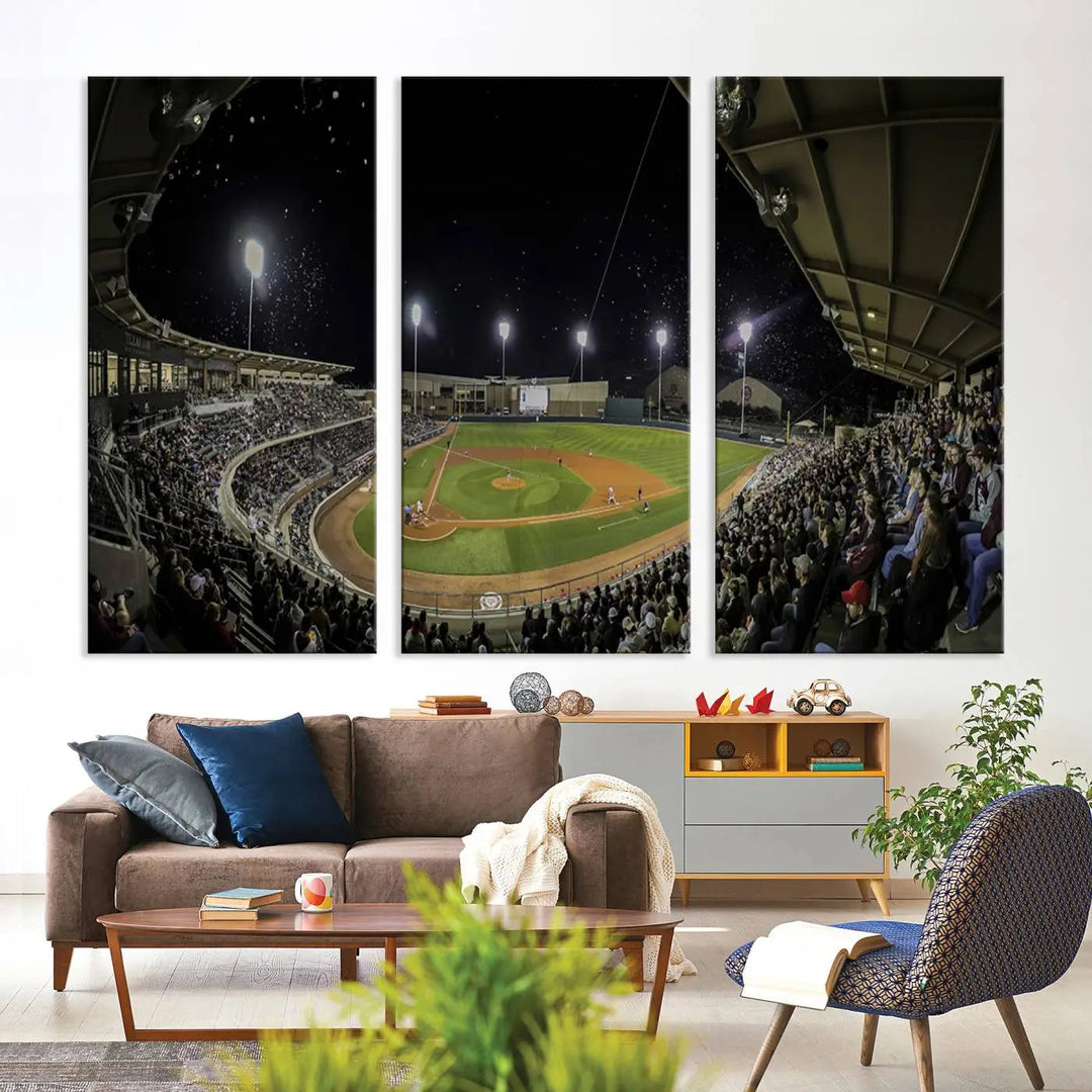 The living room is accentuated by the gallery-quality finish of a stunning three-panel canvas, the "Olsen Field at Blue Bell Park - Texas A&M Aggies Baseball Stadium Wall Art Canvas Print," beautifully depicting a baseball stadium at night.