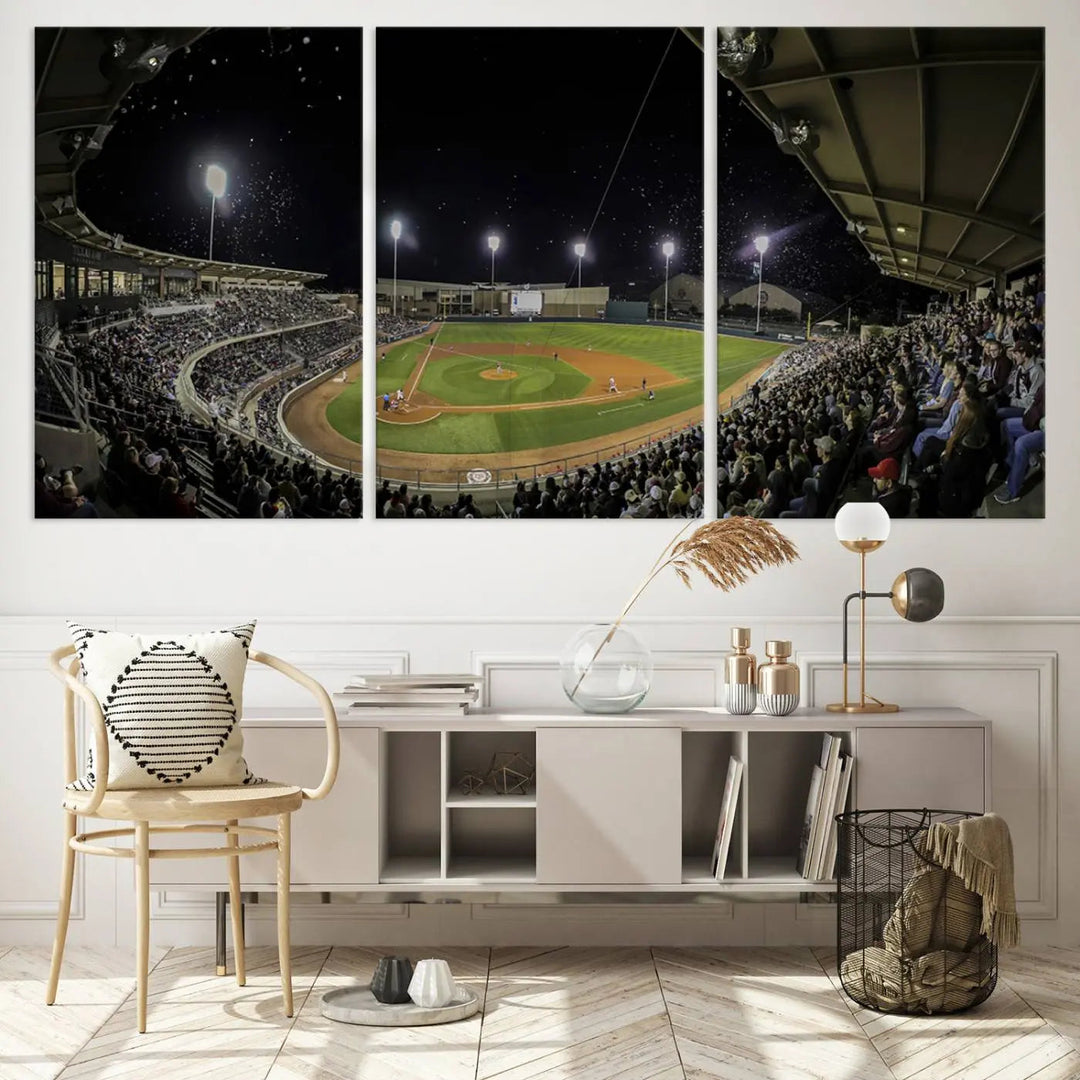 The living room is accentuated by the gallery-quality finish of a stunning three-panel canvas, the "Olsen Field at Blue Bell Park - Texas A&M Aggies Baseball Stadium Wall Art Canvas Print," beautifully depicting a baseball stadium at night.