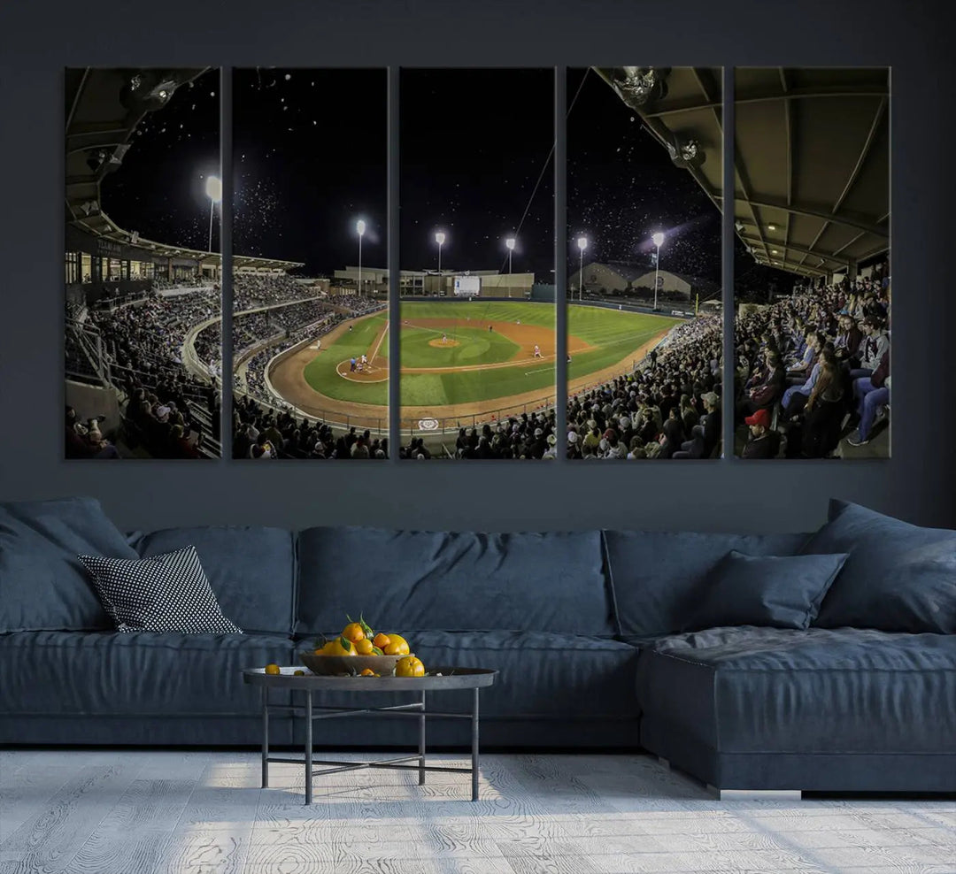 The living room is accentuated by the gallery-quality finish of a stunning three-panel canvas, the "Olsen Field at Blue Bell Park - Texas A&M Aggies Baseball Stadium Wall Art Canvas Print," beautifully depicting a baseball stadium at night.