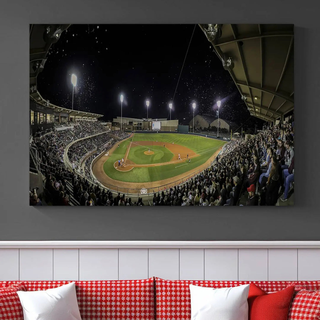 The living room is accentuated by the gallery-quality finish of a stunning three-panel canvas, the "Olsen Field at Blue Bell Park - Texas A&M Aggies Baseball Stadium Wall Art Canvas Print," beautifully depicting a baseball stadium at night.