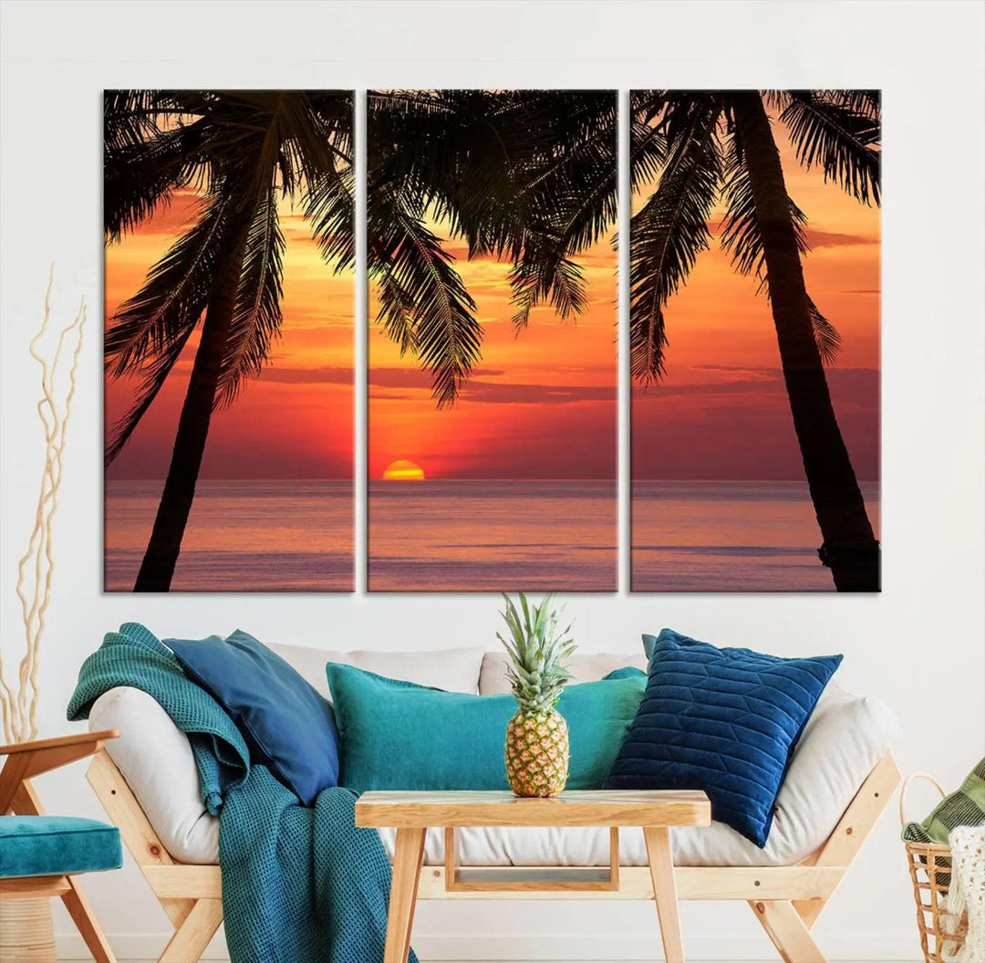 The living room features the "Palm Sunset Sea Ocean Beach Wall Art Canvas Print, Framed Ready to Hang" above the sofa.