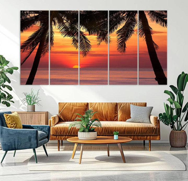 The living room features the "Palm Sunset Sea Ocean Beach Wall Art Canvas Print, Framed Ready to Hang" above the sofa.