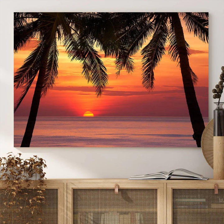 The living room features the "Palm Sunset Sea Ocean Beach Wall Art Canvas Print, Framed Ready to Hang" above the sofa.