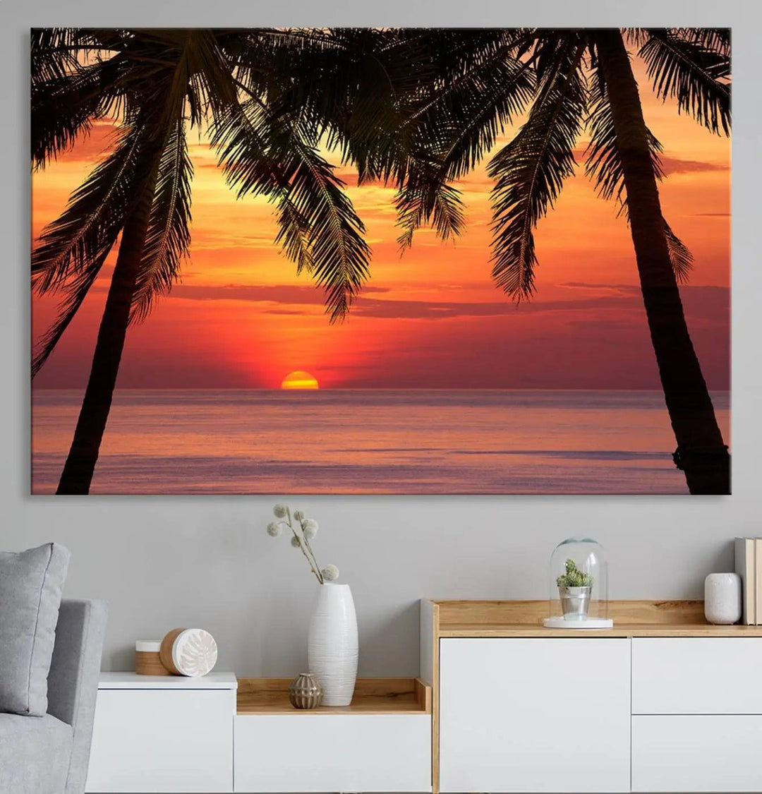 The living room features the "Palm Sunset Sea Ocean Beach Wall Art Canvas Print, Framed Ready to Hang" above the sofa.