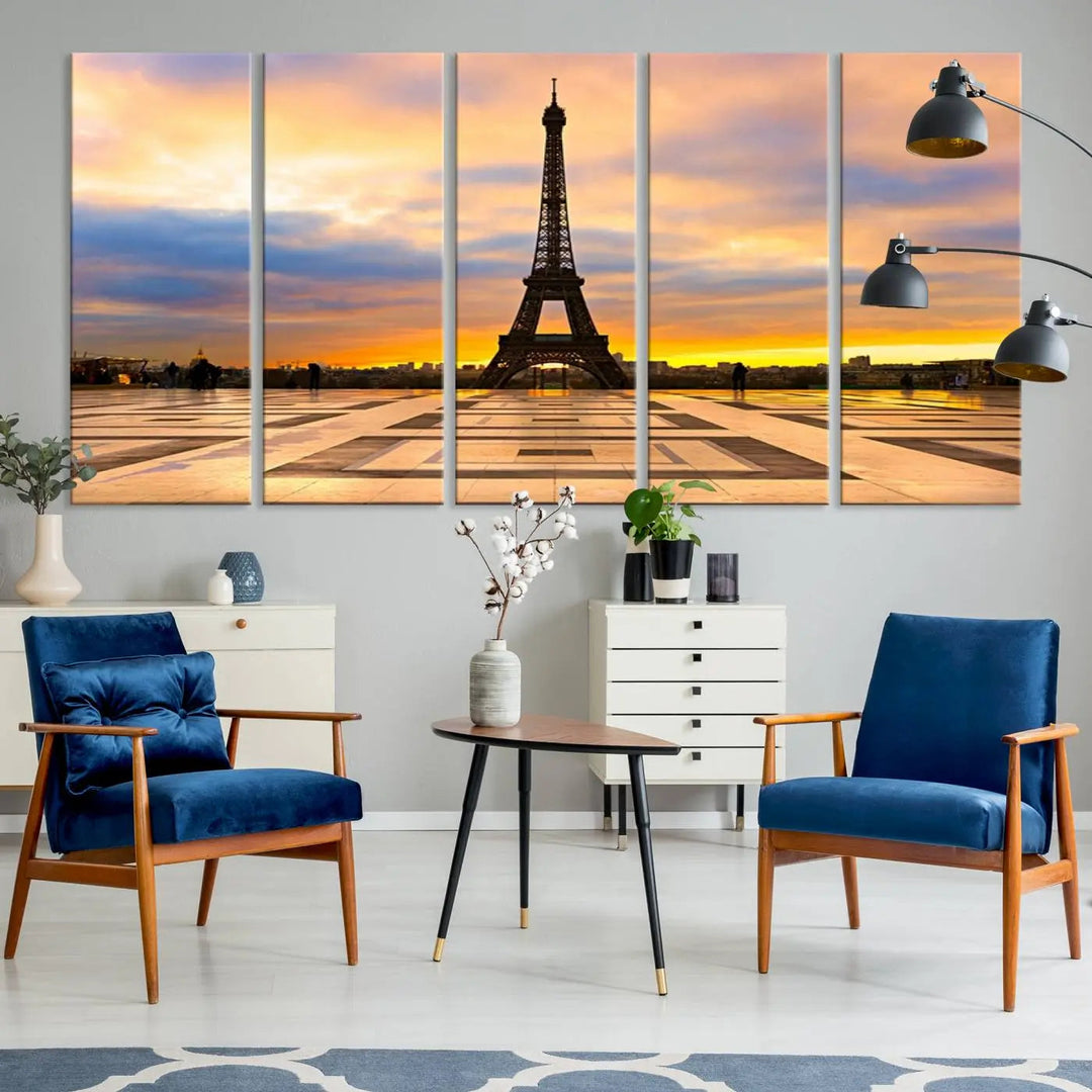 A captivating Paris Eiffel Tower Sunset Canvas Wall Art Print, featuring vibrant colors and showcasing the iconic landmark, is elegantly displayed in a frame on a wooden wall.