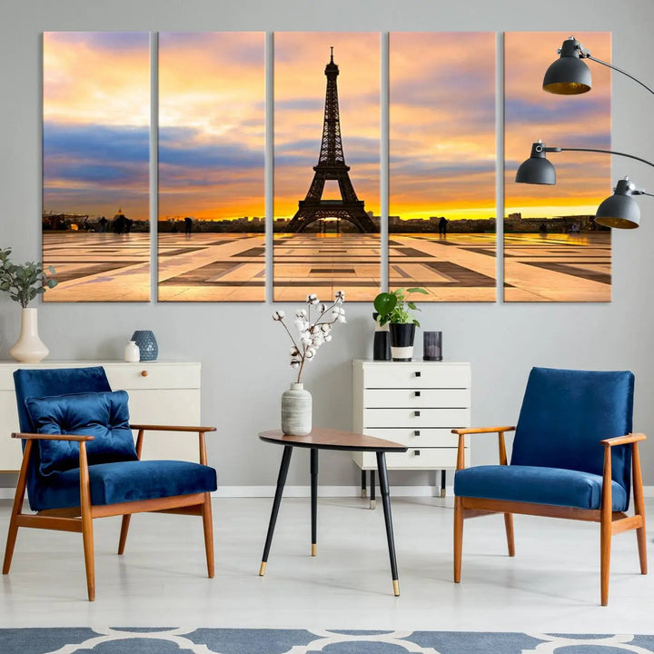 A captivating Paris Eiffel Tower Sunset Canvas Wall Art Print, featuring vibrant colors and showcasing the iconic landmark, is elegantly displayed in a frame on a wooden wall.