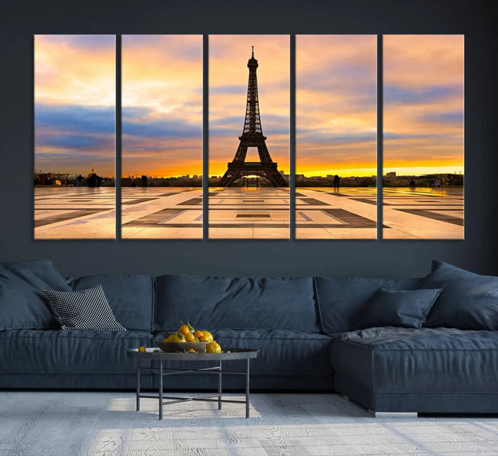 A captivating Paris Eiffel Tower Sunset Canvas Wall Art Print, featuring vibrant colors and showcasing the iconic landmark, is elegantly displayed in a frame on a wooden wall.
