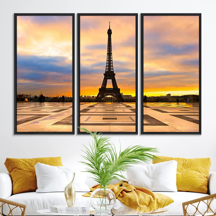 A captivating Paris Eiffel Tower Sunset Canvas Wall Art Print, featuring vibrant colors and showcasing the iconic landmark, is elegantly displayed in a frame on a wooden wall.