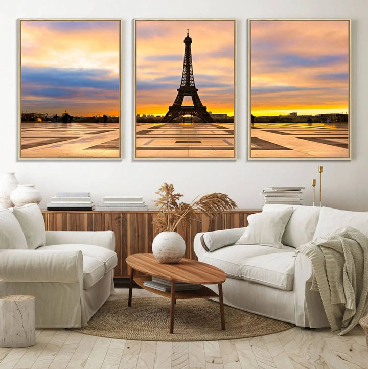 A captivating Paris Eiffel Tower Sunset Canvas Wall Art Print, featuring vibrant colors and showcasing the iconic landmark, is elegantly displayed in a frame on a wooden wall.