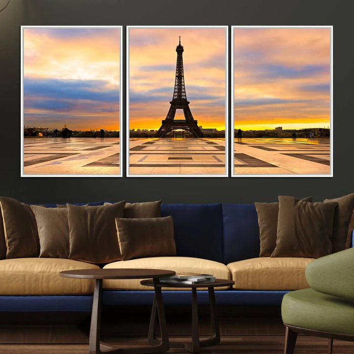 A captivating Paris Eiffel Tower Sunset Canvas Wall Art Print, featuring vibrant colors and showcasing the iconic landmark, is elegantly displayed in a frame on a wooden wall.