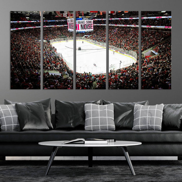 The living room features the PNC Arena Raleigh North Carolina Hurricanes Hockey Stadium Wall Art Canvas Print, which depicts a crowded ice hockey stadium with enthusiastic fans and an ongoing game, all rendered in high-resolution on museum-quality canvas.