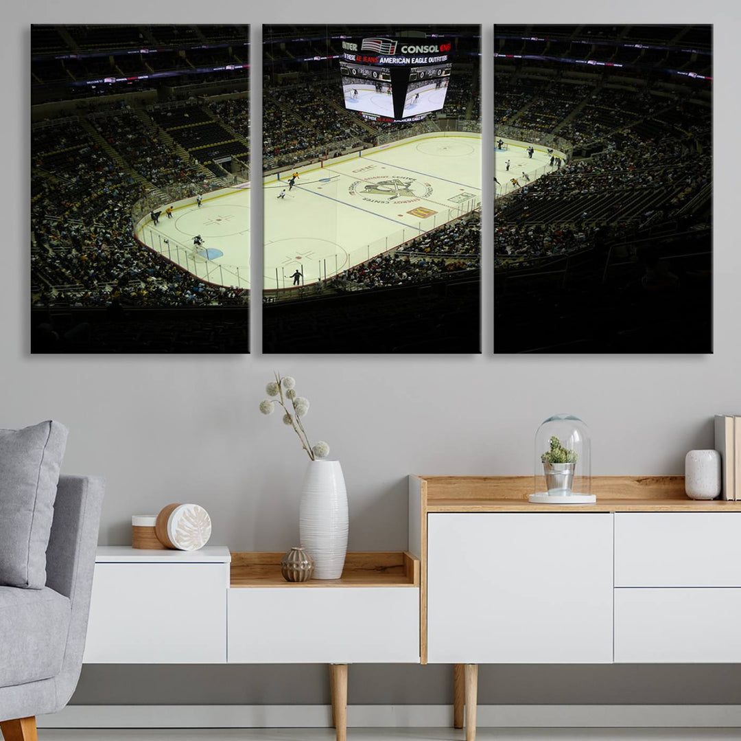 This museum-quality canvas captures a stunning aerial view of an ice hockey game at the PPG Paints Arena, home of the Pittsburgh Penguins in Pennsylvania. The artwork features a well-lit arena with a digital scoreboard above the rink, delivered in high-resolution printing and ready to hang.