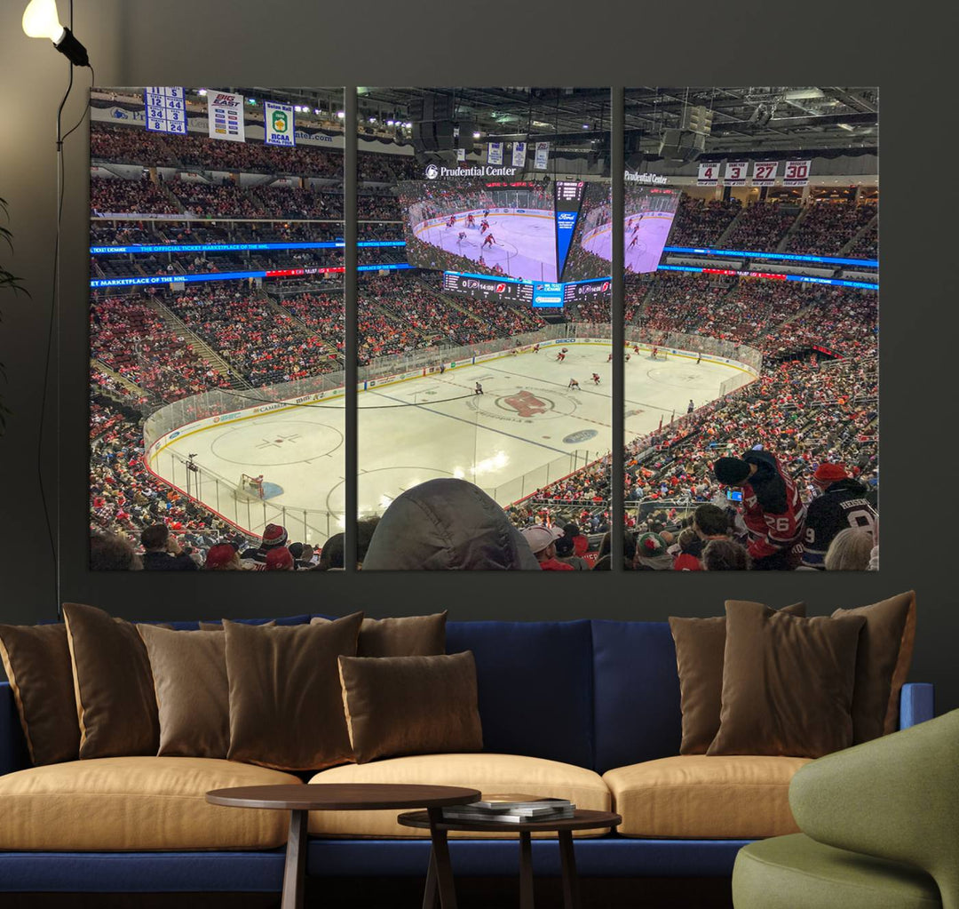 A living room showcases the Prudential Center Newark New Jersey Devils Hockey Stadium Wall Art Canvas Print, a large three-panel artwork depicting a packed hockey arena on museum-quality canvas.