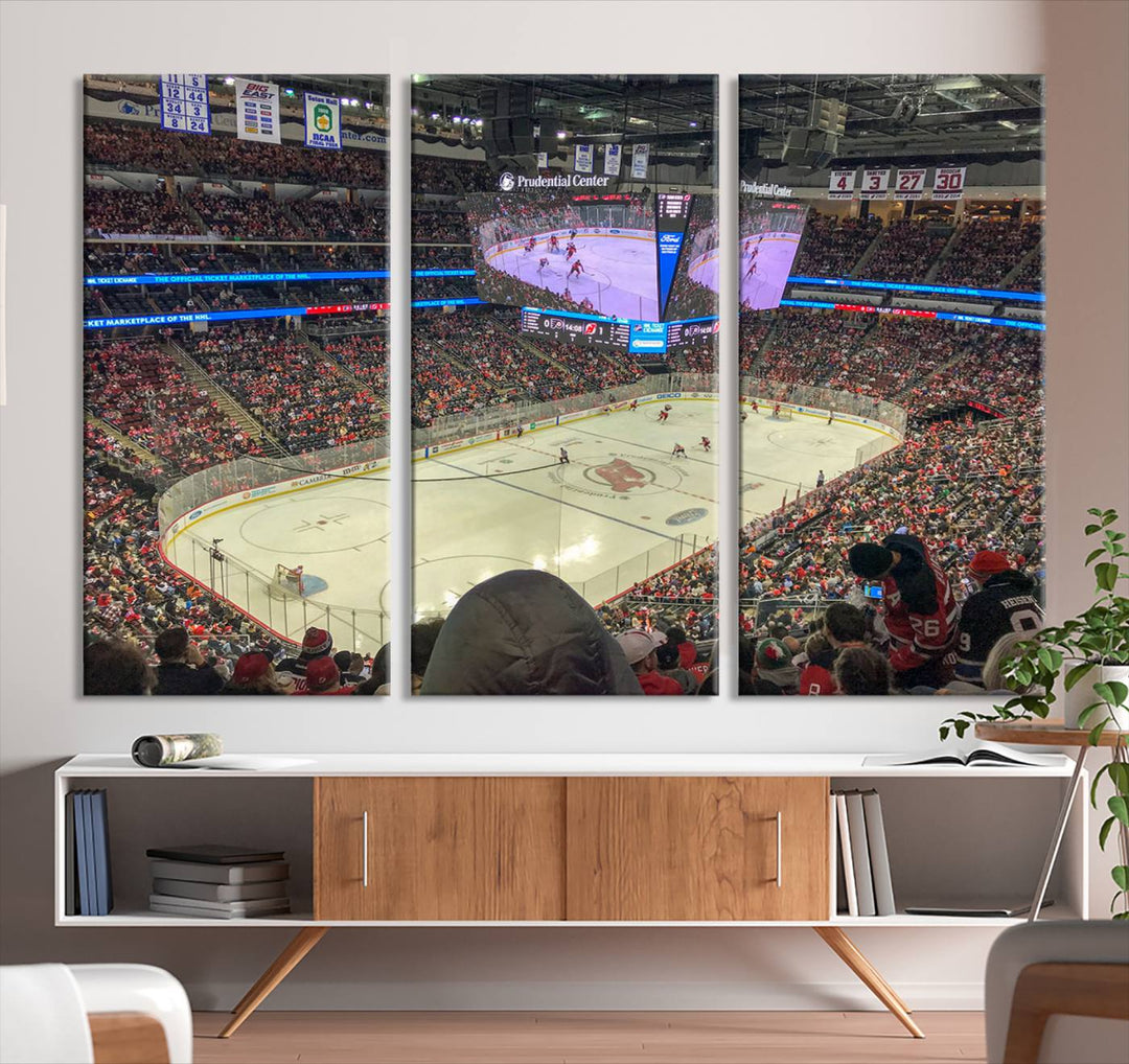 A living room showcases the Prudential Center Newark New Jersey Devils Hockey Stadium Wall Art Canvas Print, a large three-panel artwork depicting a packed hockey arena on museum-quality canvas.