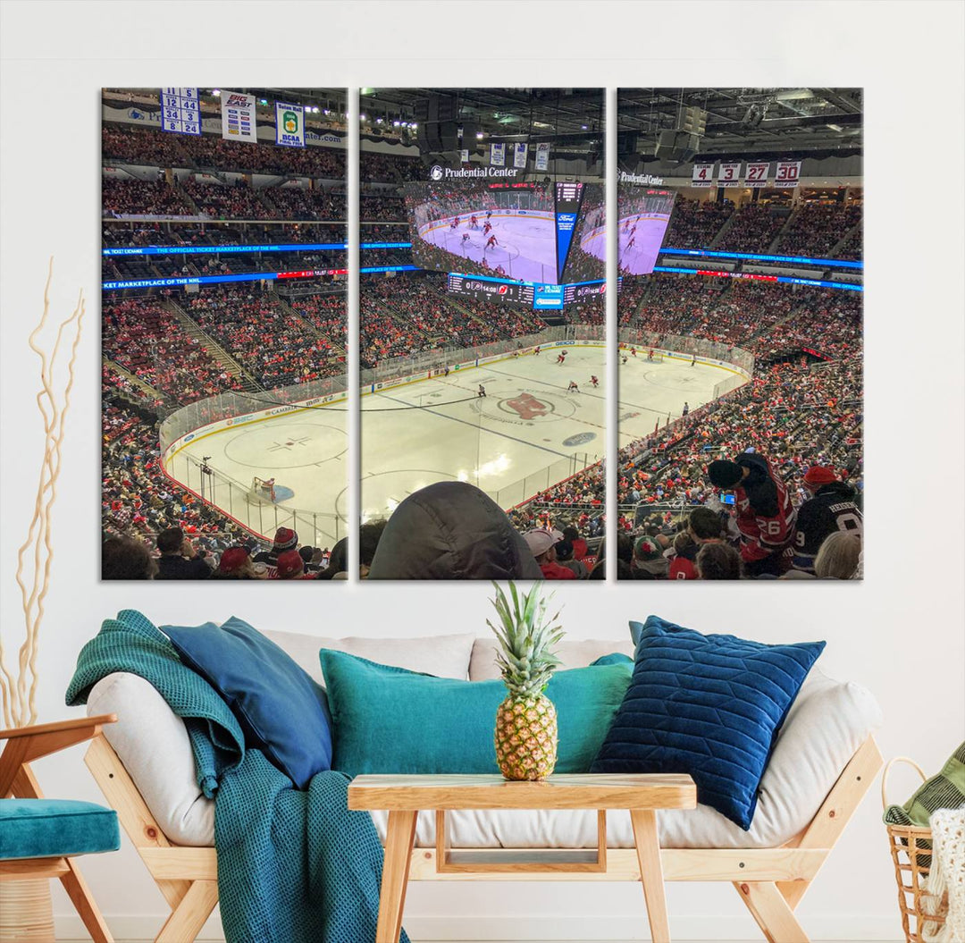 A living room showcases the Prudential Center Newark New Jersey Devils Hockey Stadium Wall Art Canvas Print, a large three-panel artwork depicting a packed hockey arena on museum-quality canvas.