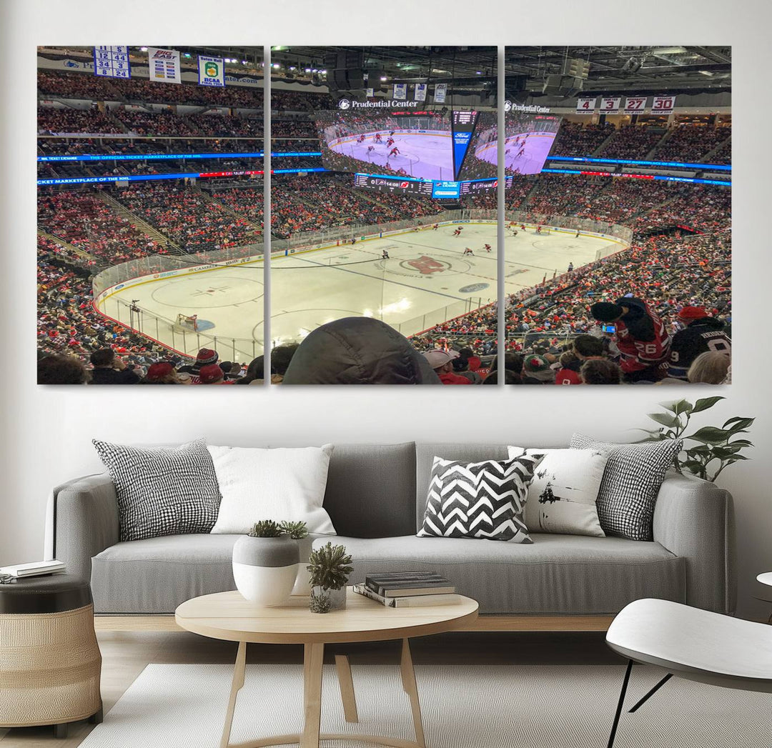 A living room showcases the Prudential Center Newark New Jersey Devils Hockey Stadium Wall Art Canvas Print, a large three-panel artwork depicting a packed hockey arena on museum-quality canvas.