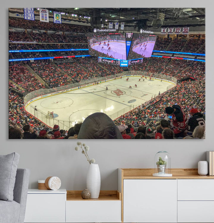 A living room showcases the Prudential Center Newark New Jersey Devils Hockey Stadium Wall Art Canvas Print, a large three-panel artwork depicting a packed hockey arena on museum-quality canvas.