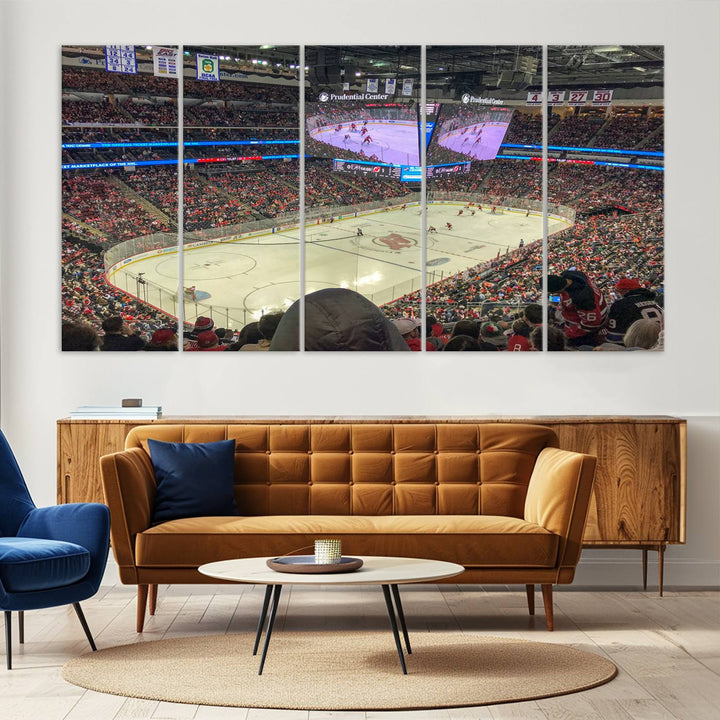 A living room showcases the Prudential Center Newark New Jersey Devils Hockey Stadium Wall Art Canvas Print, a large three-panel artwork depicting a packed hockey arena on museum-quality canvas.