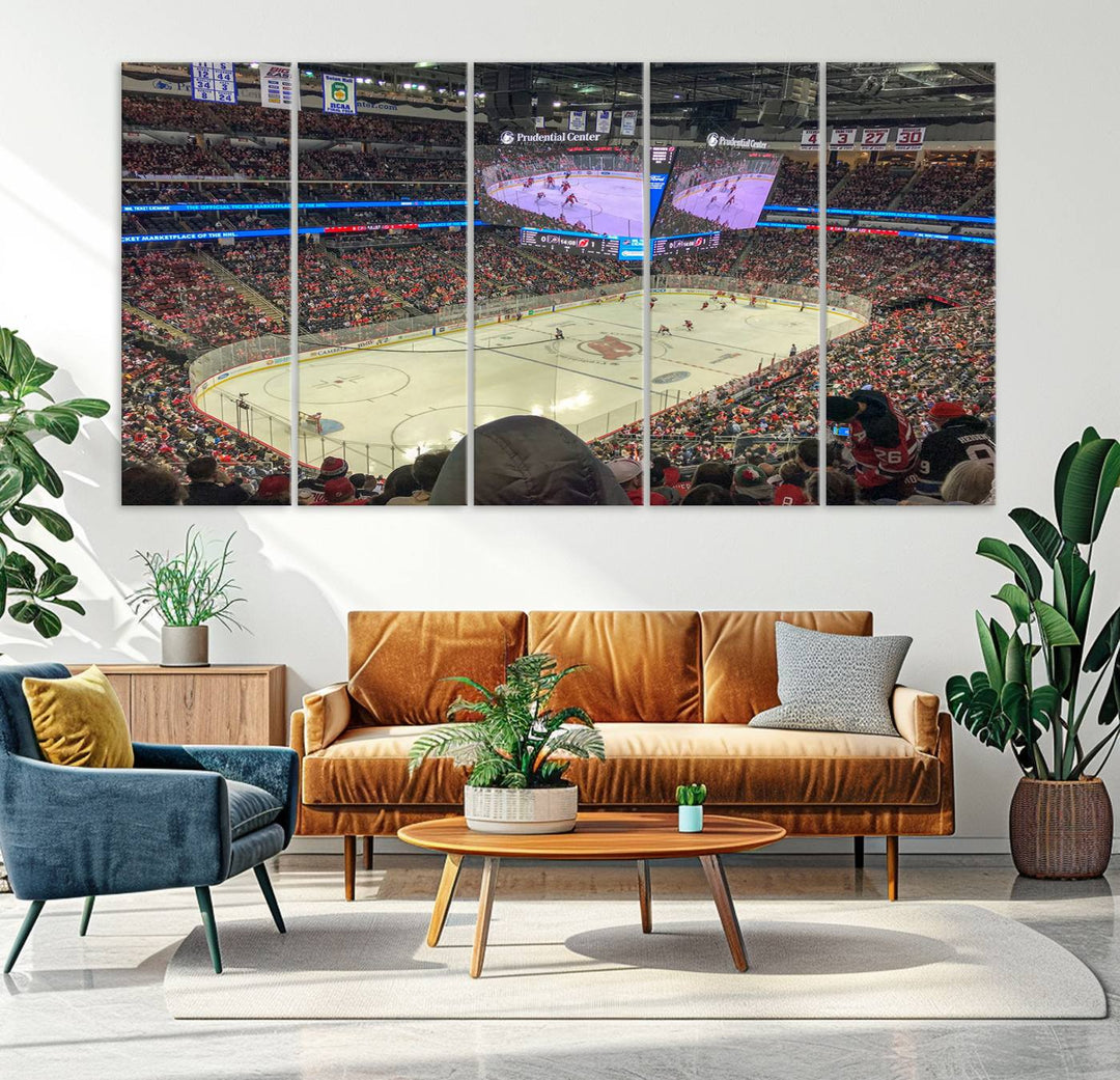 A living room showcases the Prudential Center Newark New Jersey Devils Hockey Stadium Wall Art Canvas Print, a large three-panel artwork depicting a packed hockey arena on museum-quality canvas.