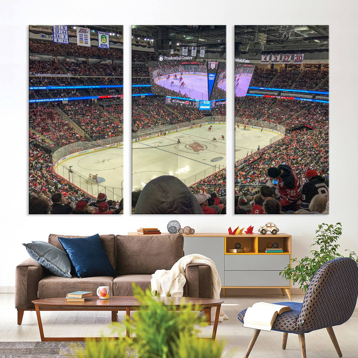 A living room showcases the Prudential Center Newark New Jersey Devils Hockey Stadium Wall Art Canvas Print, a large three-panel artwork depicting a packed hockey arena on museum-quality canvas.