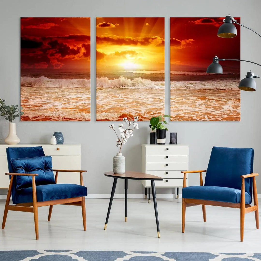 Red Sunset Ocean Beach Canvas Wall Art showcases a stunning three-panel masterpiece that captures a vivid beach sunset over ocean waves.