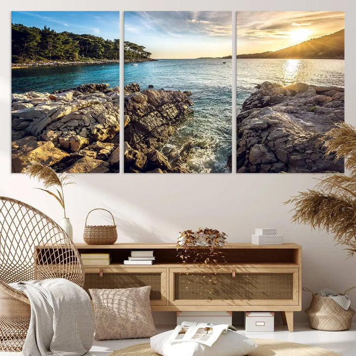 The "Rocky Shoreline Sunset Triptych Canvas Wall Art" features a coastal landscape giclee print, capturing the ocean horizon in a gallery-wrapped style.