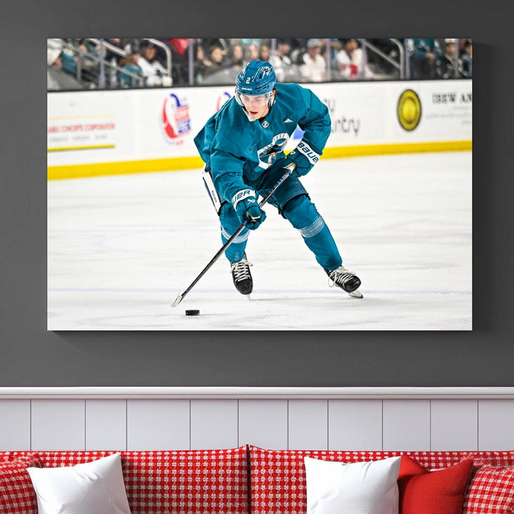 The San Jose Sharks Ice Hockey Player Wall Art Canvas Print beautifully depicts a hockey player in a teal uniform skating with the puck on ice during a game. Captured in vibrant colors and high-resolution, the spectators blur into the background, creating an artwork worthy of museum-quality presentation.