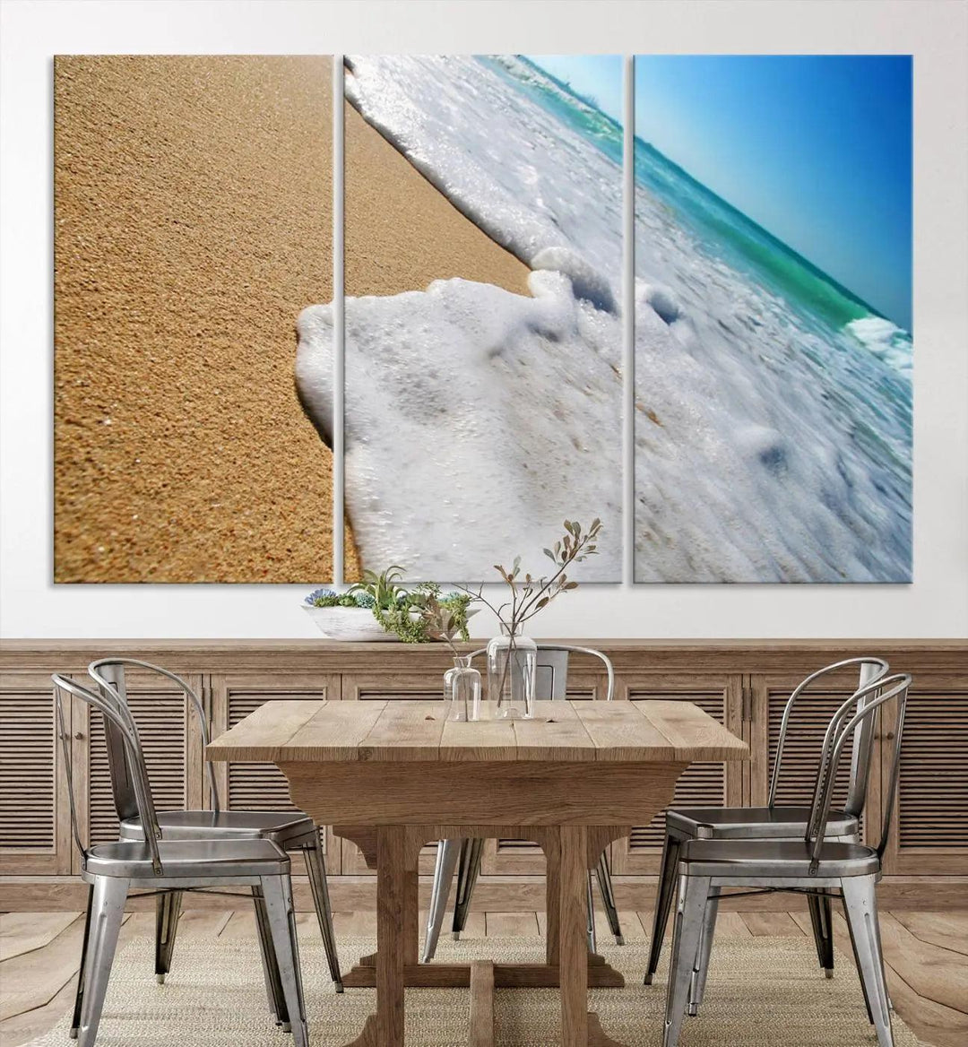 Sandy shoreline close-up ocean wave canvas print. Beach wall art with giclee canvas and gallery wrap, perfect for coastal living decor.