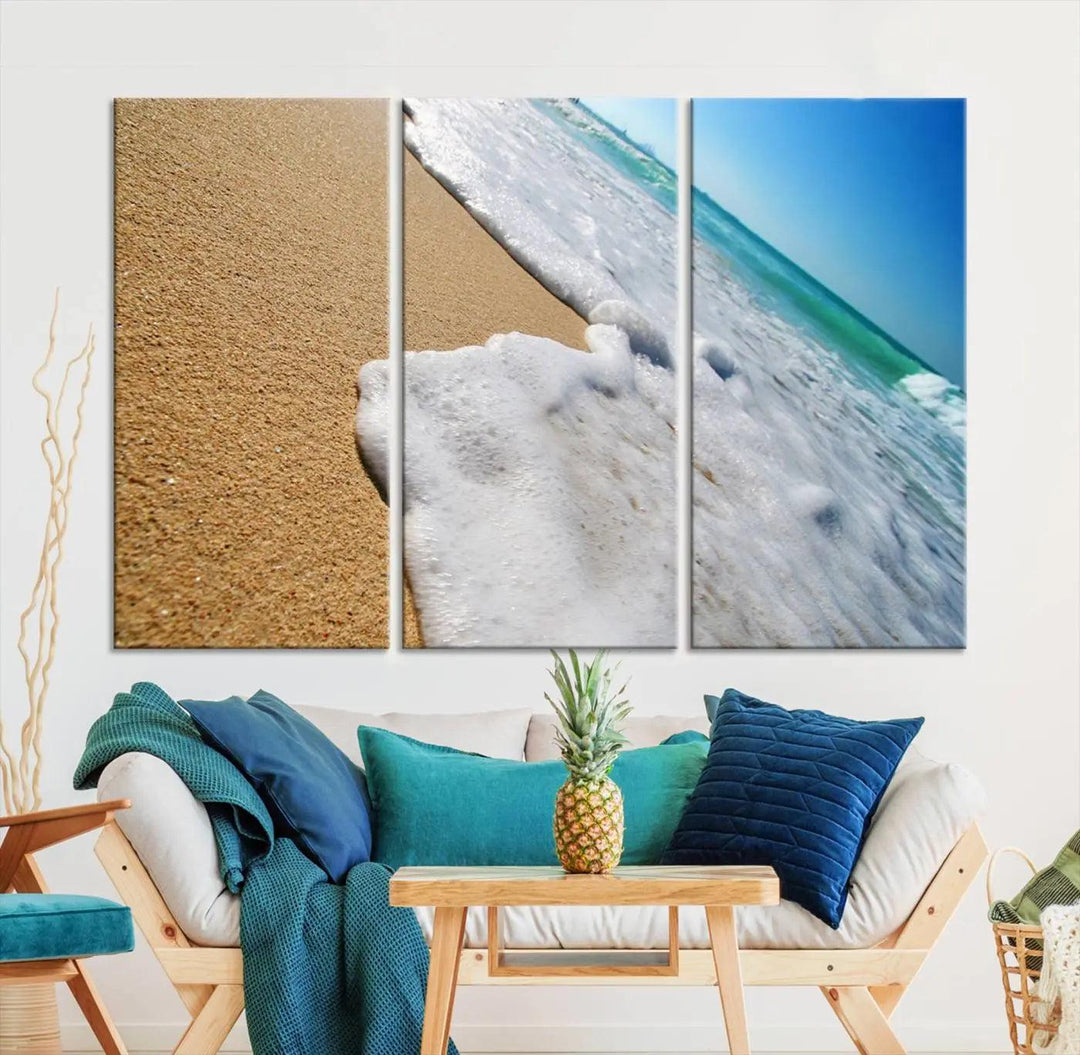 Sandy shoreline close-up ocean wave canvas print. Beach wall art with giclee canvas and gallery wrap, perfect for coastal living decor.