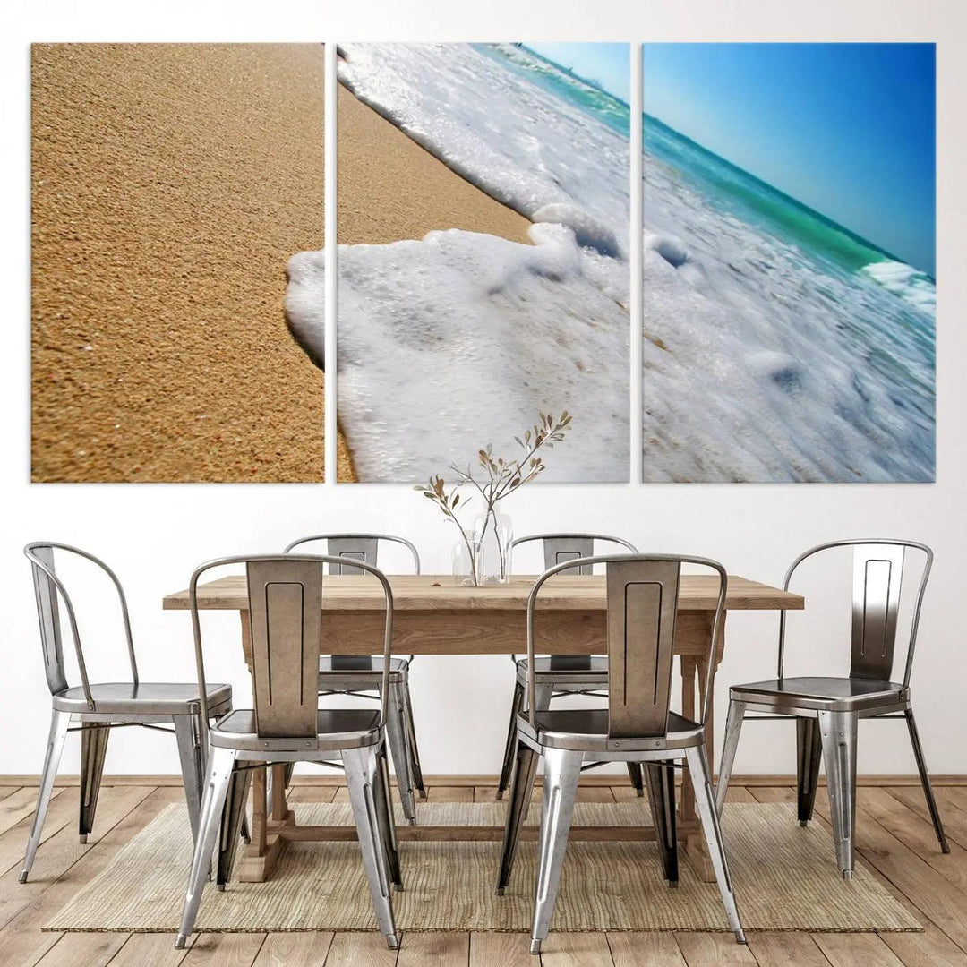 Sandy shoreline close-up ocean wave canvas print. Beach wall art with giclee canvas and gallery wrap, perfect for coastal living decor.