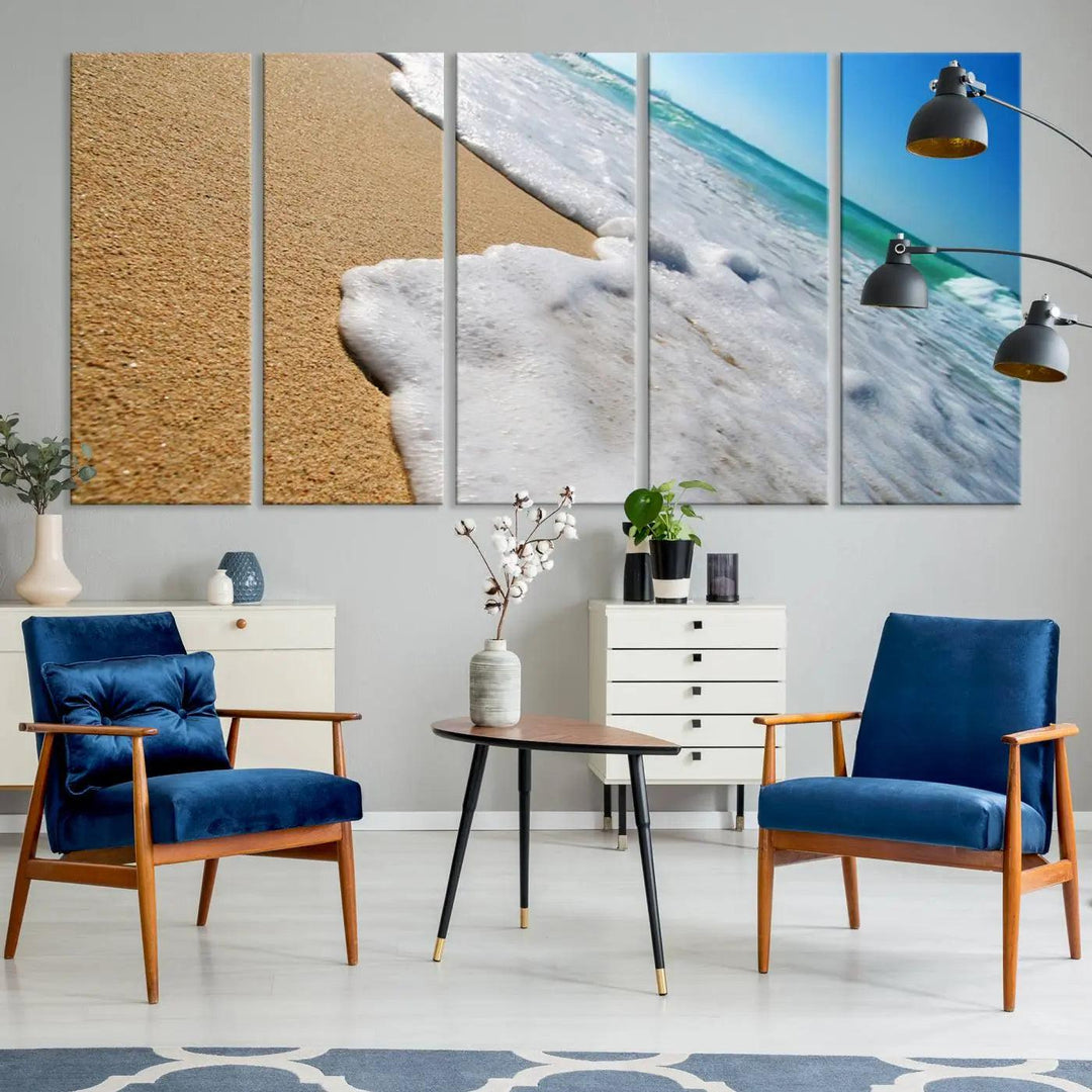 Sandy shoreline close-up ocean wave canvas print. Beach wall art with giclee canvas and gallery wrap, perfect for coastal living decor.