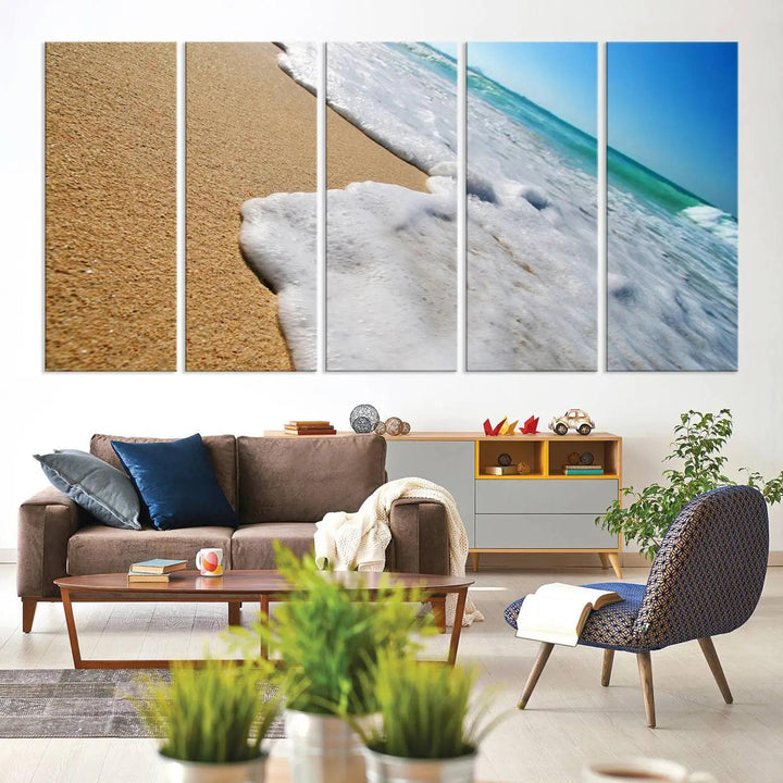 Sandy shoreline close-up ocean wave canvas print. Beach wall art with giclee canvas and gallery wrap, perfect for coastal living decor.