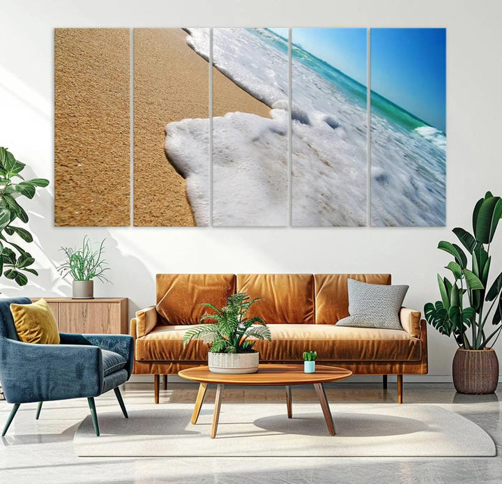 Sandy shoreline close-up ocean wave canvas print. Beach wall art with giclee canvas and gallery wrap, perfect for coastal living decor.