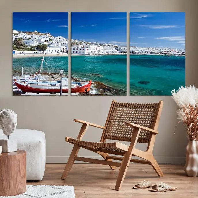 The Santorini Wall Art Canvas Print, showcasing a triptych of a coastal Greek village with white buildings and a turquoise sea, enhances the modern living room.