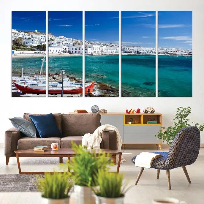 The Santorini Wall Art Canvas Print, showcasing a triptych of a coastal Greek village with white buildings and a turquoise sea, enhances the modern living room.