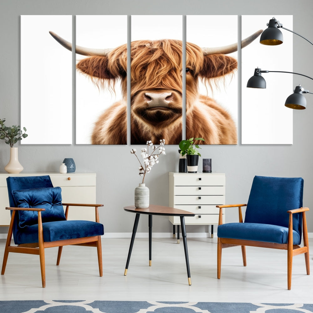 A Scottish Highland Cow Canvas Print, featuring a trio of panels depicting a long-haired, large-horned Highland cow on museum-quality canvas with UV protection, was displayed.