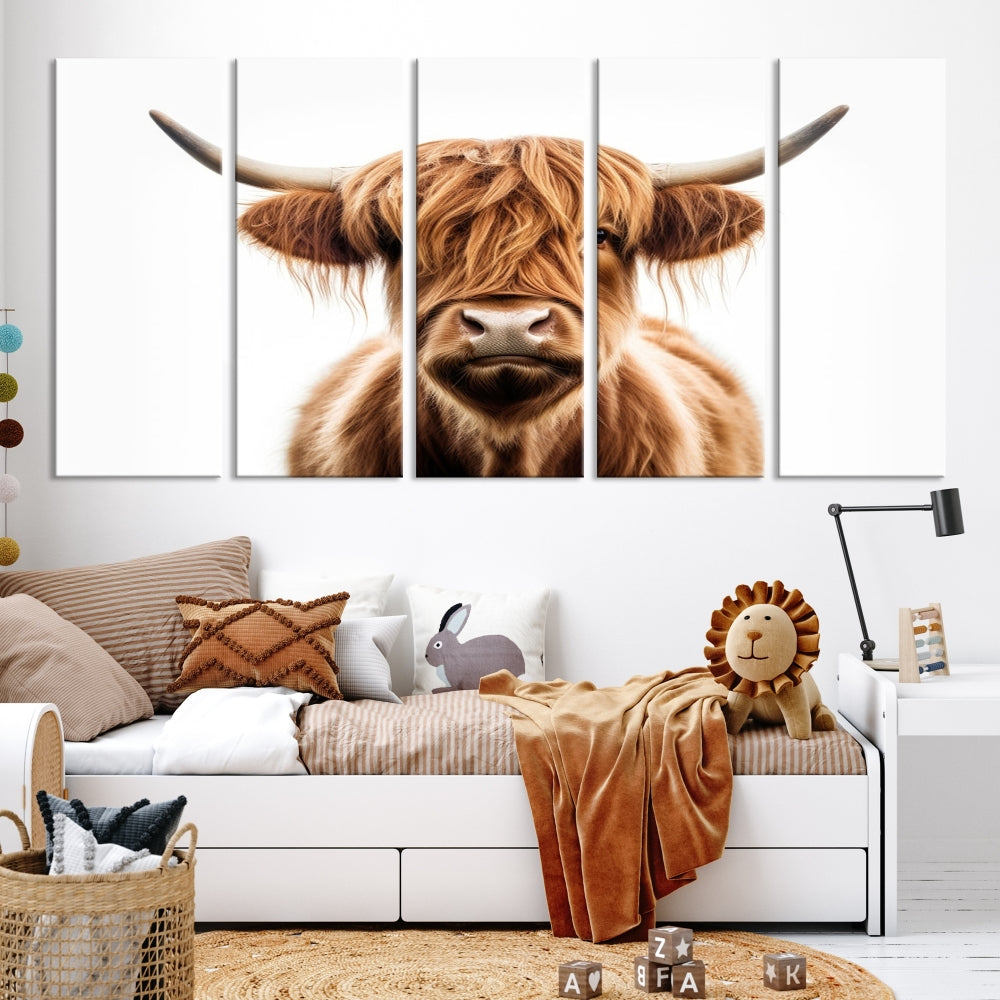 A Scottish Highland Cow Canvas Print, featuring a trio of panels depicting a long-haired, large-horned Highland cow on museum-quality canvas with UV protection, was displayed.