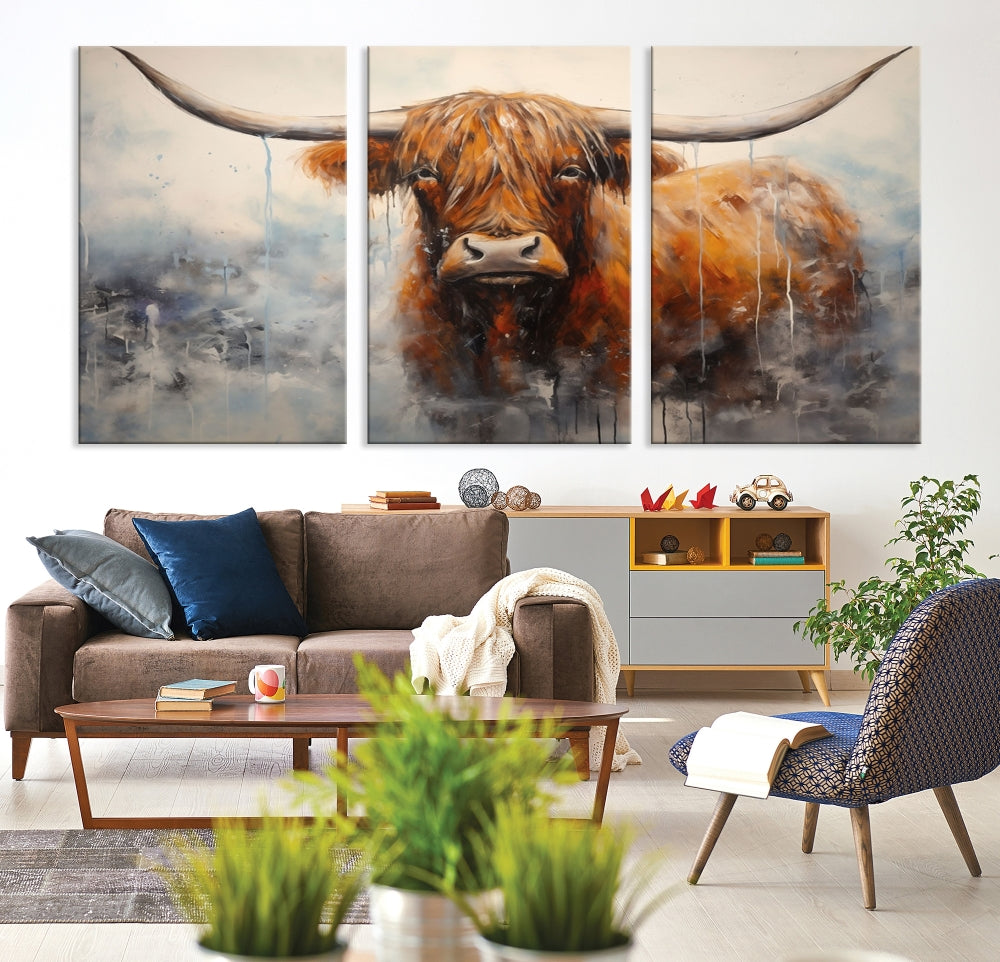 The stunning Scottish Highland Cow Canvas Wall Art enhances the room with its rustic decor. Its three-panel design features a longhorn animal theme, creating a striking presence on the dark wall.