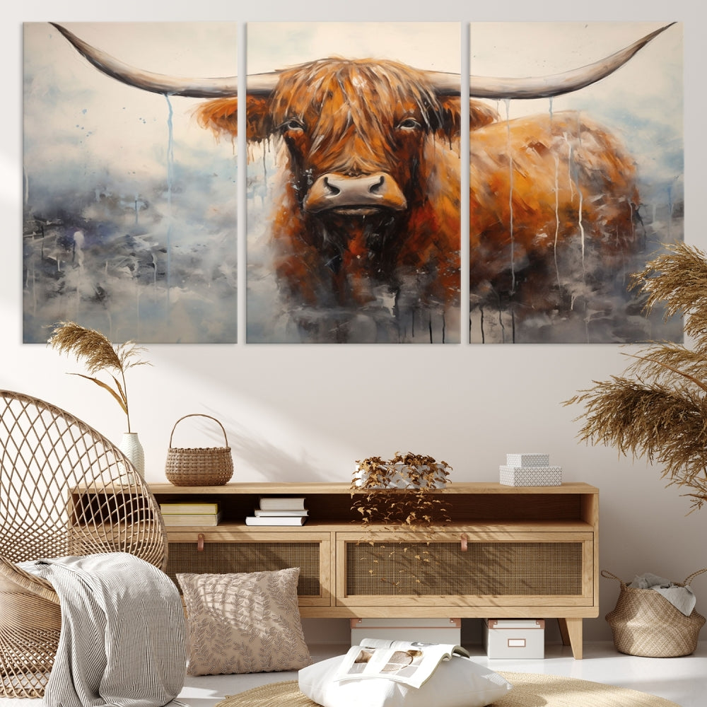 The stunning Scottish Highland Cow Canvas Wall Art enhances the room with its rustic decor. Its three-panel design features a longhorn animal theme, creating a striking presence on the dark wall.