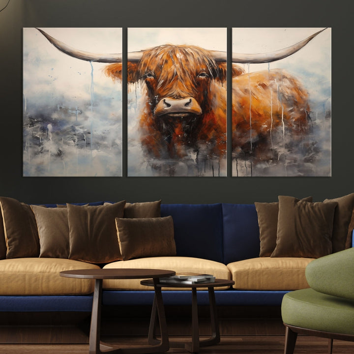 The stunning Scottish Highland Cow Canvas Wall Art enhances the room with its rustic decor. Its three-panel design features a longhorn animal theme, creating a striking presence on the dark wall.