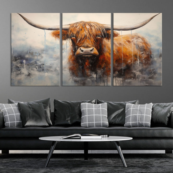 The stunning Scottish Highland Cow Canvas Wall Art enhances the room with its rustic decor. Its three-panel design features a longhorn animal theme, creating a striking presence on the dark wall.