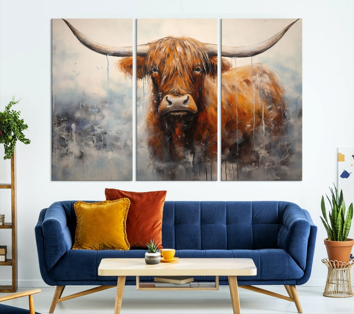 The stunning Scottish Highland Cow Canvas Wall Art enhances the room with its rustic decor. Its three-panel design features a longhorn animal theme, creating a striking presence on the dark wall.