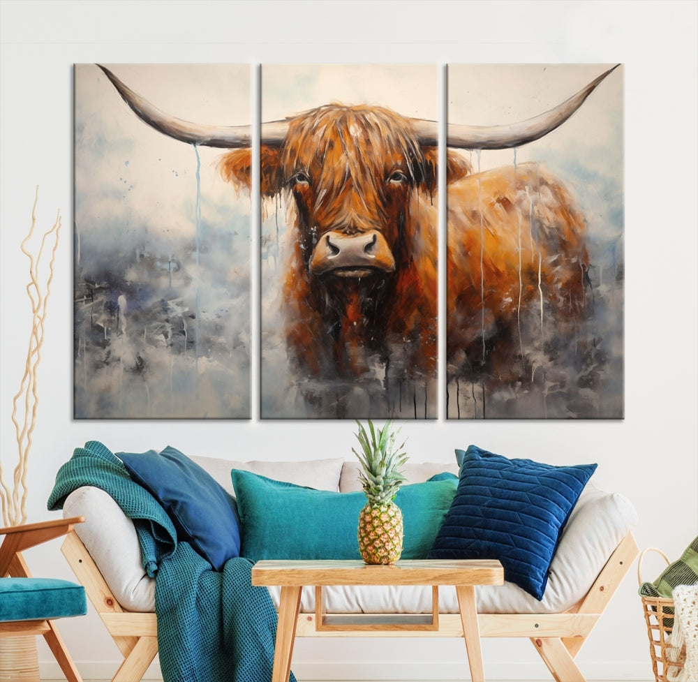 The stunning Scottish Highland Cow Canvas Wall Art enhances the room with its rustic decor. Its three-panel design features a longhorn animal theme, creating a striking presence on the dark wall.